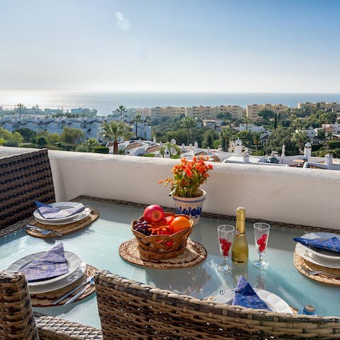 Enjoy a Mediterranean lifestyle by dining outdoors with sparkling sea views