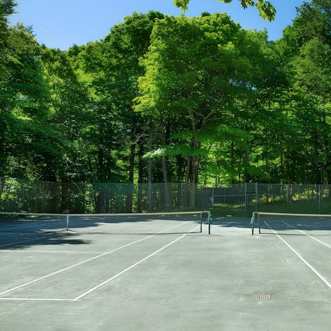Get competitive playing tennis on the shared courts or splash about in the pool