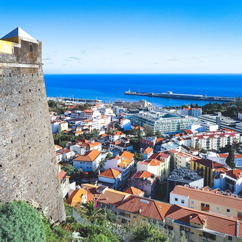 Walk or take a bus to the centre of Funchal, and experience local life in the Madeiran capital