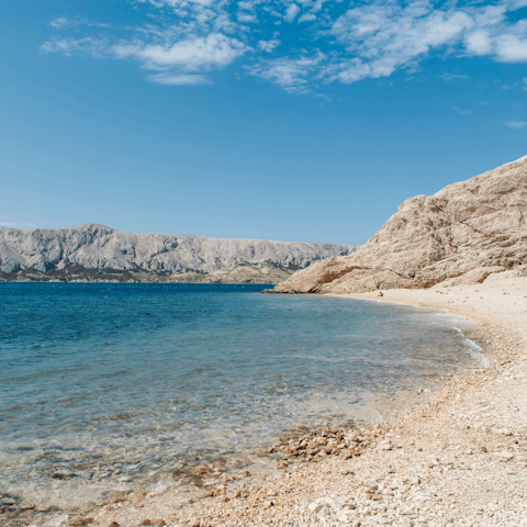 Spend a day on the pebbled Piso Aliki Beach, a short drive away