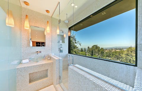 Expect your morning shower routine to take a little longer with vistas like this