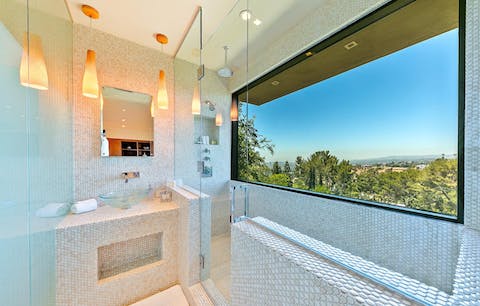 Expect your morning shower routine to take a little longer with vistas like this
