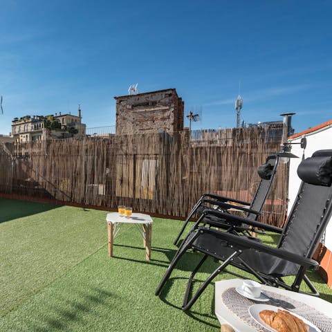 Head up to the building's rooftop terrace for a dose of Catalan sunshine