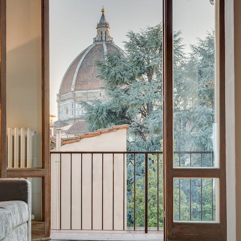 Gaze out at views of the Duomo through the French balcony doors in the lounge