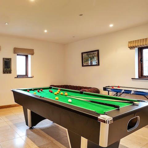 Challenge your family to a game of pool in the communal games room