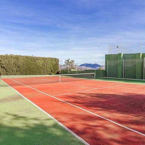 Energise your stay with games of tennis on the nearby court