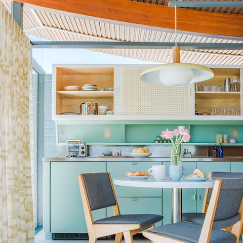 Enjoy your morning coffee in the pastel kitchen