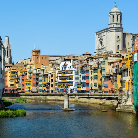 Take a day trip to pretty Girona, a short drive away