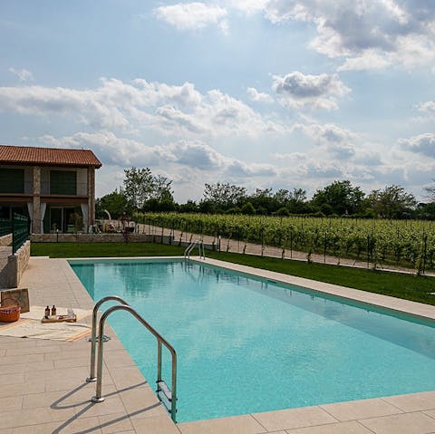 Unwind with a dip in the communal pool and admire the views
