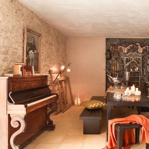 Gather in the main living room to listen to the sounds of the piano