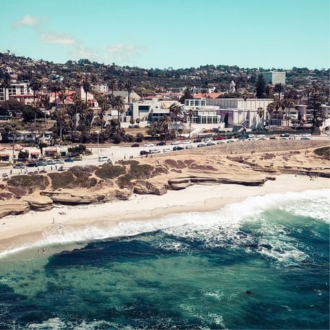 Cross the road and sink your feet into the sand of La Jolla Shores beach