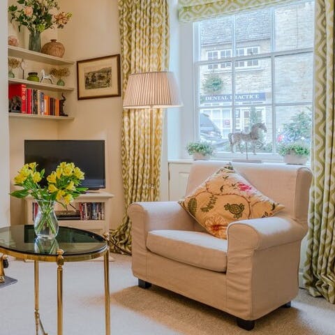 Make the most of the home library and snuggle up in the arm chair with a book in hand 
