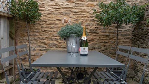 Enjoy a glass of wine outside on the private stone terrace 