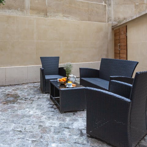 Relish your morning croissants on the private patio area 
