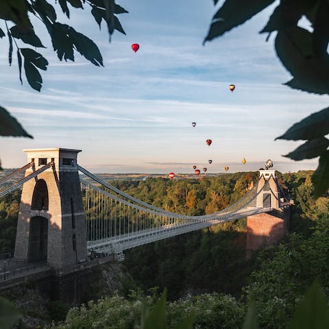 Stroll across the iconic Clifton Suspension Bridge, a thirty-minute walk away