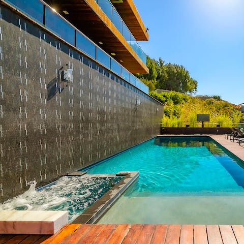 Take a dip in the pool or the hot tub – or both simultaneously 