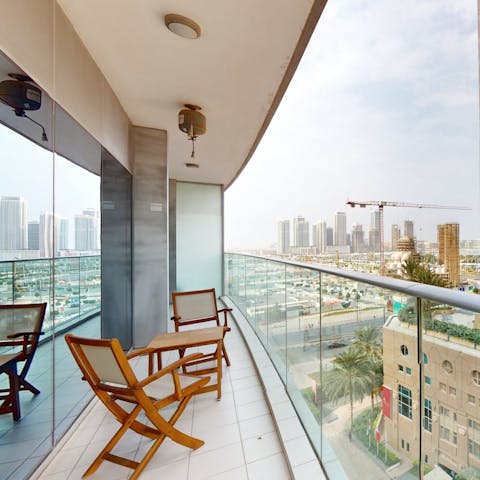 Sip your morning coffee on the private balcony, taking in the cityscape