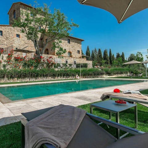 Enjoy total relaxation while lounging by the private pool