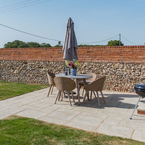 Enjoy barbecue and alfresco meals in the garden when the weather is kind