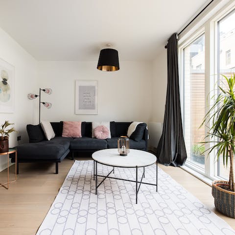 Take a minute to relax in the bright living space before venturing into the city