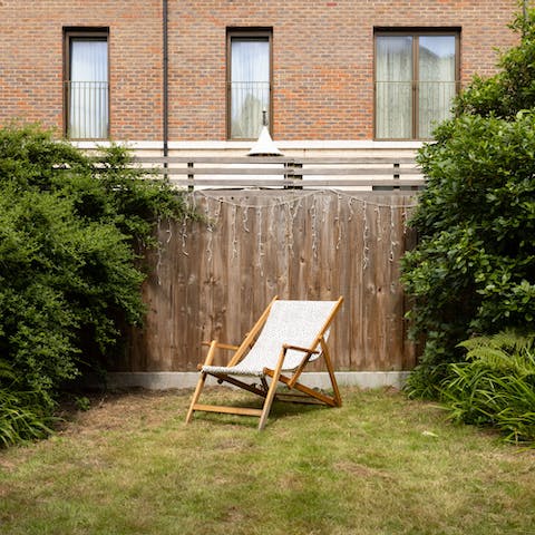 Sit back and catch some sun in your private garden