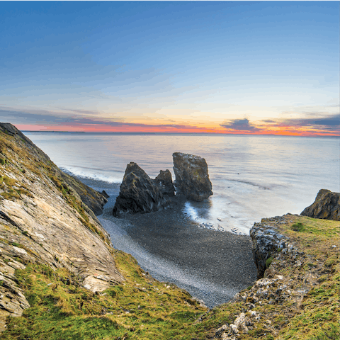 Discover golden stretches of sand, secluded coves and hidden caves that dot the coastline