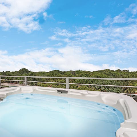 Lap up the views from the comfort of your private hot tub