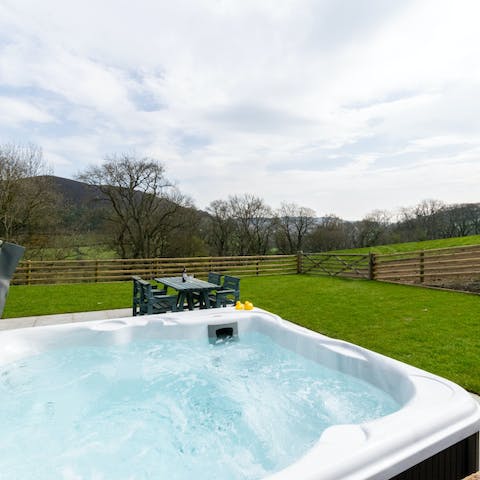 Take a soothing soak in the bubbling hot tub