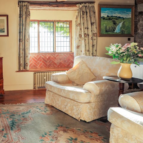 Unwind on the plush lounge seating after a day out in the East Sussex countryside 