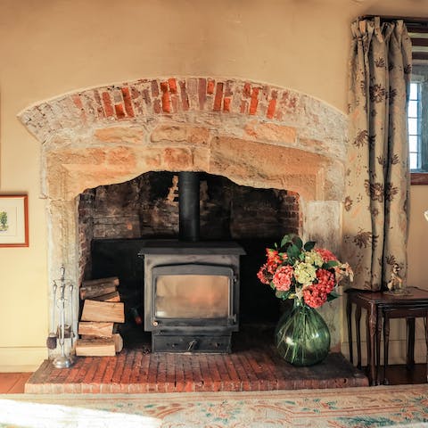 Get cosy in front of the wood burner fire on cold winter's evenings 