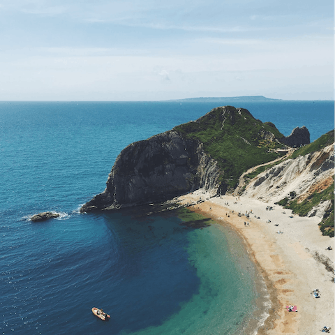 Admire the majestic Jurassic Coast, where you'll find rugged cliffs and soft sandy beaches