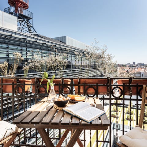 Step out onto the private balcony for a view over Madrid's rooftops