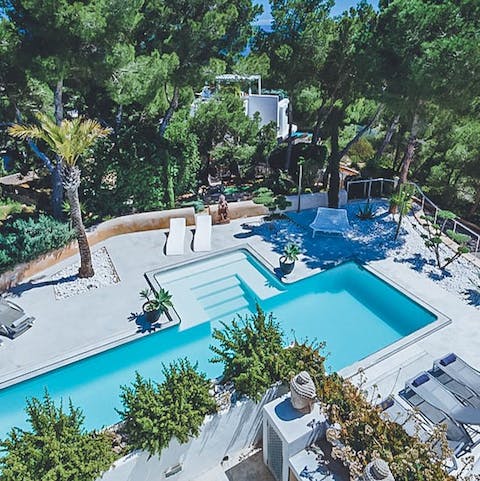 Splash about in the luxurious salt water pool or lounge on the comfy sun loungers 