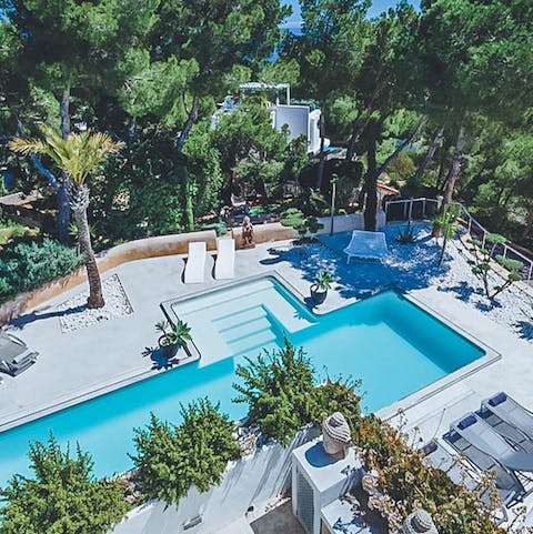 Splash about in the luxurious salt water pool or lounge on the comfy sun loungers