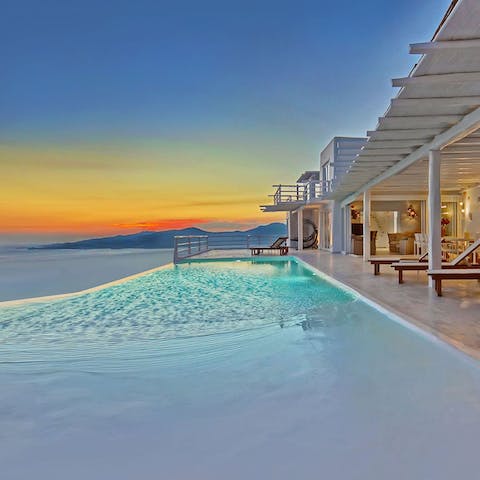 Slip into the stunning infinity pool for a sunset swim