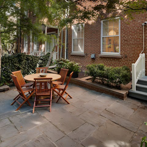 Enjoy the last of the evening sun in the private backyard