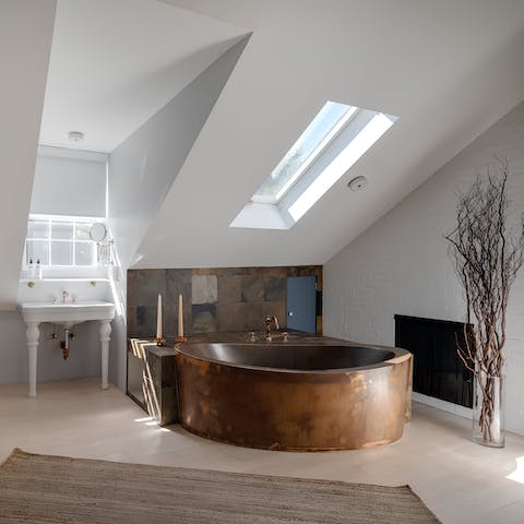 Soak in the stylish free-standing tub after a day sightseeing in the city