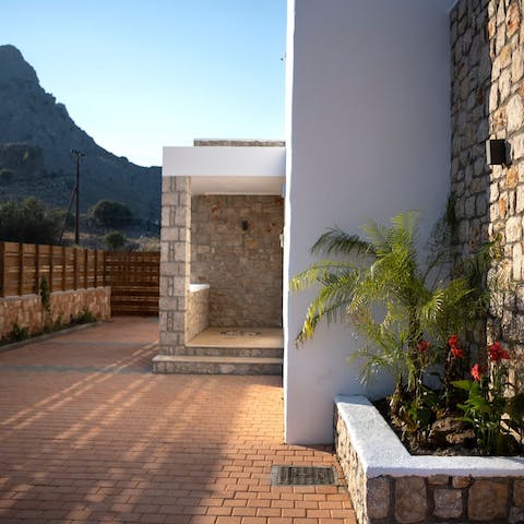 Freshen up in the outdoor shower after a road trip across rural Rhodes