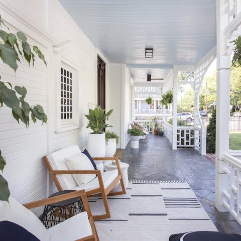 Settle in the lounge chairs on the porch, soaking up the neighbourhood energy