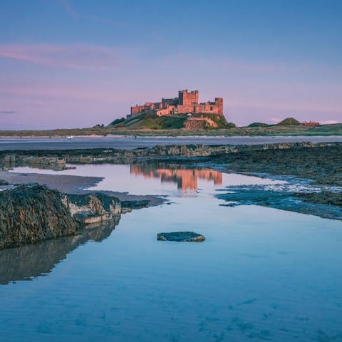 Visit the Bamburgh Castle, the finest coastal fortress in the country is a little over ten minutes away