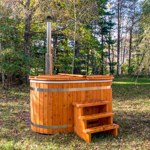 Relax and unwind under the stars in the outdoor hot tub