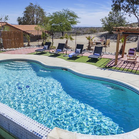Cool down with a refreshing dip in the swimming pool when the desert heat rises
