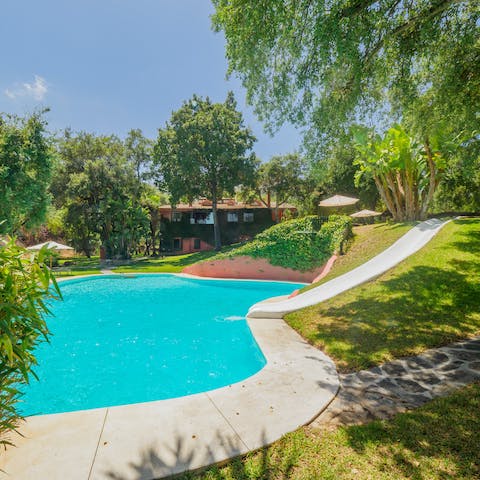 Enjoy access to the communal pools, with one featuring a built-in slide