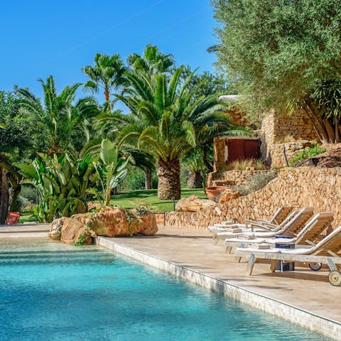Find a blissful state of relaxation while lounging by the pool