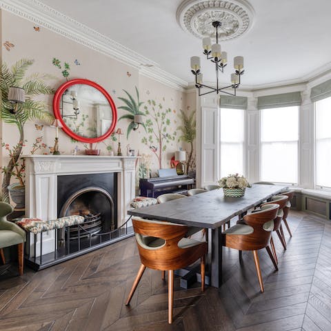 Light up the fireplace and enjoy a feast in the eclectic dining room