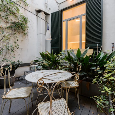 Sip local wine in the charming, vintage-style courtyard