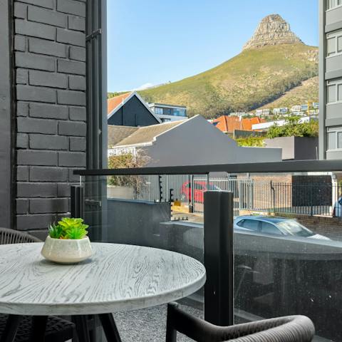 Admire the vistas of Lion's Head from the private balcony