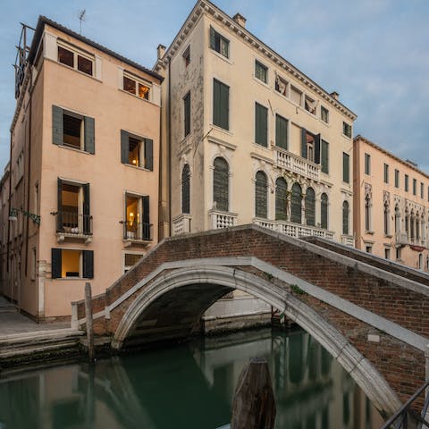Stay along one of Venice's iconic canals and get around the city by romantic gondola rides