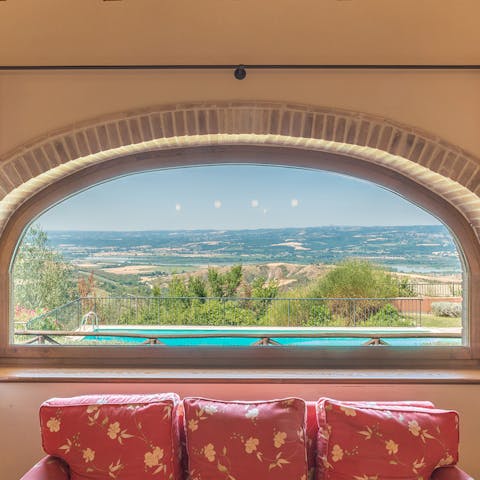Take in the view of the Oasi di Alviano from the big arched window in the living room