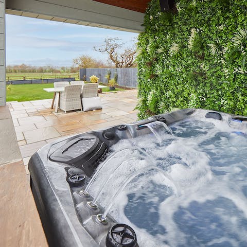 Toast the day from your private hot tub